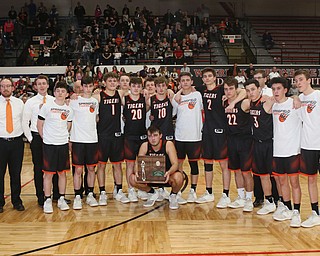 The Springfield High School basketball team poses with the Regional Runner-up trophy after losing to Richmond 46-43 at the Canton Fieldhouse on Friday night.  Dustin Livesay  |  The Vindicator  3/15/19  Canton