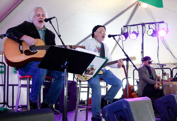 From left, Tom Sailor, Sonny Hrehovcick, and Jeff Spencer of Shoe Shine Boys perform at Shamrock the Block on West Federal Street on Sunday afternoon. EMILY MATTHEWS | THE VINDICATOR