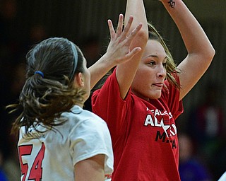 CANFIELD, OHIO - MARCH 19, 2019: Lisbon's Chloe Smith looks to pass against Canfield's Serena Sammarone during the first half of the 49th annual Al Beach Classic, Tuesday night at Canfield High School. DAVID DERMER | THE VINDICATOR