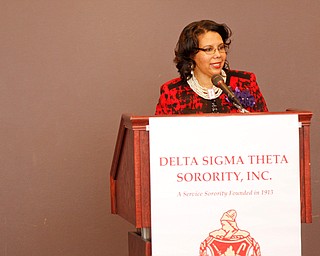 Susan Moorer, the president of the Youngstown Alumnae Chapter of Delta Sigma Theta Sorority, Inc., introduces guest speaker Beverly E. Smith, the National President and CEO of Delta Sigma Theta Sorority, Inc., during the Delta Sigma Theta Sorority, Inc. Youngstown Alumnae Chapter Founders Day Celebration on Saturday afternoon in YSU's DeBartolo Stadium Club. EMILY MATTHEWS | THE VINDICATOR