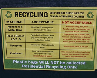 This sign is on a recycling bin at the Trumbull Career and Technical Center in Champion. It explains the newest guidelines for materials that should and should not be recycled. 