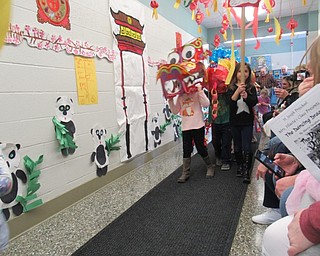 Neighbors | Jessica Harker.Family members of Early Childhood Learning Center students watched as preschoolers performed the Dance of the Dragon in celebration of the Chinese New Year Feb. 28.