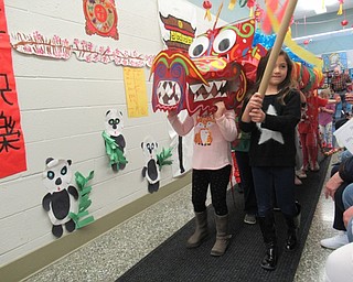 Neighbors | Jessica Harker.Preschool students in Jennifer Hlasta's class performed the Dance of the Dragon Feb. 28 celebrating Chinese New Year.