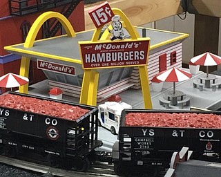 Neighbors | Submitted.A replica of an old McDonalds building stands behind a model of the Youngstown Sheet and Tubing train cars in Dennis Mamones personal collection.