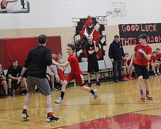 Neighbors | Abby Slanker.A member of the Canfield Village Middle School seventh-grade boys basketball team made a fast break for the hoop during the school’s fourth annual Students Versus Staff Basketball Game on March 8.