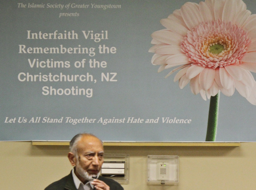 William D. Lewis The Vindicator Dr. Klaid Iqbal, president of the Islamic Society of Greater Youngstown speaks during a vigil 3-22-19 remembering 50 people killed at a New Zealand mosque.