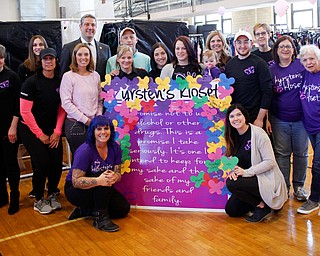 Congressman Tim Ryan poses with volunteers at the annual Kyrsten's Kloset, where anyone can get a free prom or formal dress and accessories as long as they sign a promise not to drink and drive on Saturday at the former Roosevelt Elementary in Hubbard. EMILY MATTHEWS | THE VINDICATOR