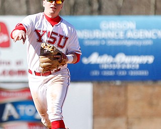 YSU's second baseman Drew Dickerson throws the ball to first baseman Trevor Wiersma during the first game of their double header against Oakland on Saturday at Eastwood Field. EMILY MATTHEWS | THE VINDICATOR