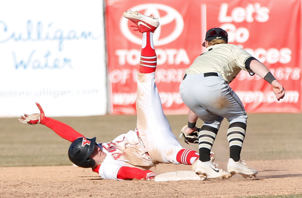 YSU's Lucas Nasonti slides safely into second as Oakland's second baseman Mario Camilletti misses the ball during the second game of their double header on Saturday at Eastwood Field. EMILY MATTHEWS | THE VINDICATOR