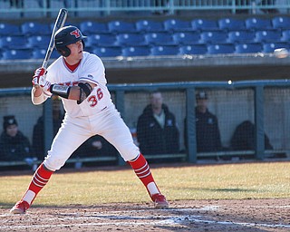 YSU's Dylan Swarmer watches as the ball comes in during the second game of their double header against Oakland on Saturday at Eastwood Field. EMILY MATTHEWS | THE VINDICATOR