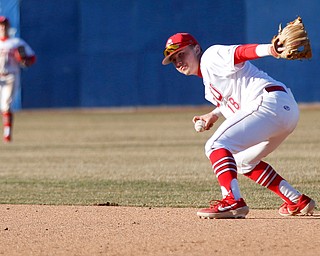 YSU's second baseman Drew Dickerson picks up the ball during the second game of their double header against Oakland on Saturday at Eastwood Field. EMILY MATTHEWS | THE VINDICATOR