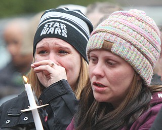 William D. Lewis The Vindicator More than 200 people attended a 3-24-19 vigil in Roosevelt Park, Campbell for a father and son who were killed in a car crash.