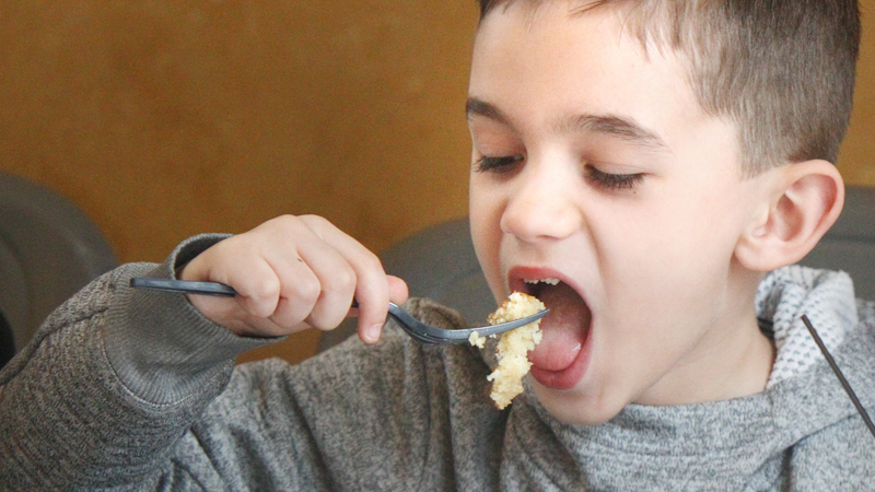 Maxwell Guido, 8, of Zelienople, Pa., enjoys pancakes Sunday at the 37th annual Boardman Rotary Pancake Breakfast and Maple Syrup Festival in Boardman Park. Maxwell attended the fundraiser
with his grandmother, Tina Guido, of Boardman.
