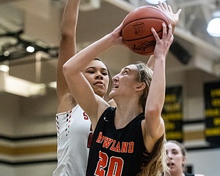 DIANNA OATRIDGE | THE VINDICATOR  Howland's Alex Ochman (20) looks to score as Struthers' Trinity McDowell defends during the Frank Bubba All-Star Classic in Warren on Tuesday.