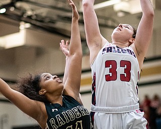 DIANNA OATRIDGE | THE VINDICATOR  Austintown Fitch's Sabria Hunter (33) shoots over Warren G. Harding's Indea Phillips (14) during the Frank Bubba All-Star Classic in Warren on Tuesday.