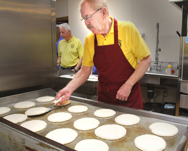 William D. Lewis The Vindicator   Bill Sweeney, a member of Boardman Rotary Club has been flipping pancakes at the club's annual pancake event for more thn 20 years.