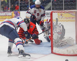 Phantoms' Trevor Kuntar watches as the puck goes past USA Hockey's National Team Development Program's net  during their school day game on Wednesday. EMILY MATTHEWS | THE VINDICATOR