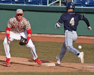 William D. Lewis The Vindicator Pitt's Bryce O'Farrell(4) is safe at first as YSU's Trevor Wiersma(19) waits for the throw during 3-27-198 game.