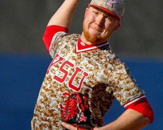 William D. Lewis the vindicator  YSU's Travis Perry(33) delivers during 3-27-19 game with Pitt.