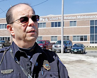 Vienna Police Chief Bob Ludt spoke with reporters outside the Pittsburgh Institute of Aeronautics after an accident with an aircraft engine and propeller resulted in severe injuries to two students. 