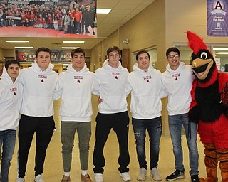 Neighbors | Abby Slanker.The Canfield High School wrestling team sent six wrestlers to the 2019 OHSAA State Wrestling Tournament. Team members included, from left, sophomore Nick Barber, senior Tyler Stein, junior Anthony D’Alesio, senior David Reinhart, junior Nick Crawford and senior Ben Cutrer. The team members were joined by the Canfield Cardinals mascot Big Red..