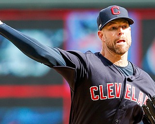 Cleveland Indians pitcher Corey Kluber delivers a pitch during the Tribe's game Thursday against the Minnesota Twins. The Twins won 2-0.

