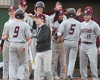 William D. Lewis The Vindicator Boardman Dylan Gurski(9) and Nick Yallech(5) get congrats after scoring  in 5th inning during 3-29-19 win over Ursuline at Cene.