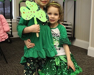 Neighbors | Abby Slanker.Mallory MacEwen (left) and her sister, Mia, dressed in the spirit of St. Patrick’s Day for the Canfield library’s St. Patrick’s Day Shenanigans story time on March 16.
