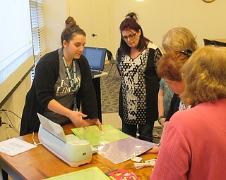 Neighbors | Jessica Harker.The Austintown library hosted a begginers Cricut class hosted by librarian Renee Beverly March 21.