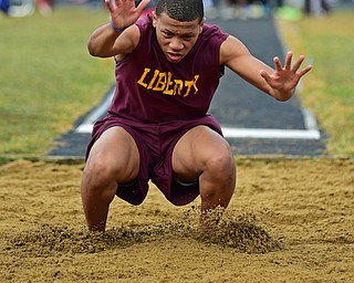 MINERAL RIDGE, OHIO - MARCH 30, 2019: Liberty's Jovan Brown competes during the boys long jump, Saturday morning during the Joe Lane Invitational at Mineral Ridge High School. DAVID DERMER | THE VINDICATOR