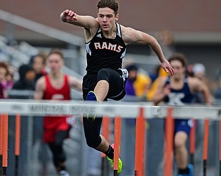 MINERAL RIDGE, OHIO - MARCH 30, 2019: Mineral Ridge's Randall Miller runs during a preliminary heat of the boys 110 yard hurdles, Saturday morning during the Joe Lane Invitational at Mineral Ridge High School. DAVID DERMER | THE VINDICATOR