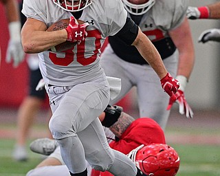 YOUNGSTOWN, OHIO - MARCH 30, 2019: Youngstown State's Joe Alessi breaks into the open field during Saturday afternoon's spring scrimmage at the Watson and Tressel Training Facility. DAVID DERMER | THE VINDICATOR