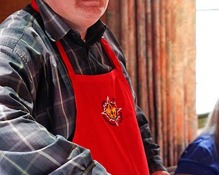 Dale Hawkins, of Boardman, serves his razorback chili, which includes beef and pork, at the eighth annual Chili Cookoff at Boardman United Methodist Church on Sunday. Hawkins won the first place judge's choice award. EMILY MATTHEWS | THE VINDICATOR