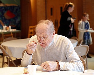 Kenneth Matteson, of Boardman, eats ice cream at the eighth annual Chili Cookoff at Boardman United Methodist Church on Sunday. EMILY MATTHEWS | THE VINDICATOR