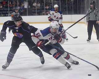 Phantoms' Aiden Gallacher reaches to try to get the puck from Team USA's Ty Smilanic during their game on Sunday. EMILY MATTHEWS | THE VINDICATOR