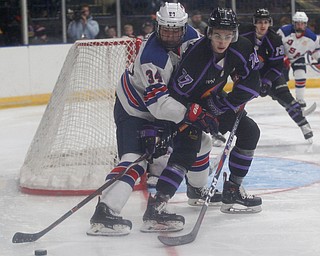 Phantoms' Matthew Barnaby Jr. and Team USA's Brock Faber battle for the puck during their game on Sunday. EMILY MATTHEWS | THE VINDICATOR