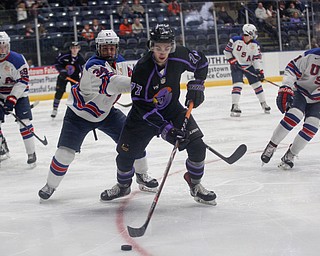 Phantoms' Matthew Barnaby Jr. and Team USA's Brock Faber battle for the puck during their game on Sunday. EMILY MATTHEWS | THE VINDICATOR