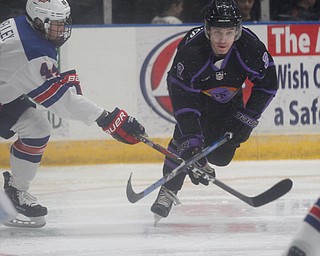 Phantoms' Aiden Gallacher tries to keep the puck from Team USA's Connor Kelley during their game on Sunday. EMILY MATTHEWS | THE VINDICATOR