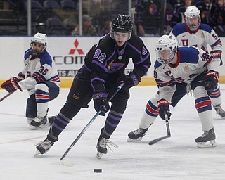 Phantoms' Liam Robertson tries to keep the puck from Team USA during their game on Sunday. EMILY MATTHEWS | THE VINDICATOR