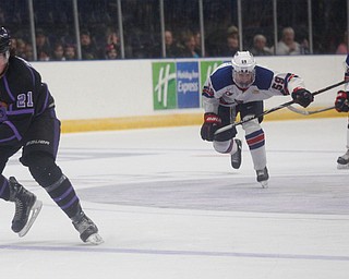 Phantoms' Brett Murray prepares to shoot and score while Team USA's Ty Smilanic, left, and Ryder Rolston chase him during their game on Sunday. Murray's goal made the score 2-3 in the second period. EMILY MATTHEWS | THE VINDICATOR