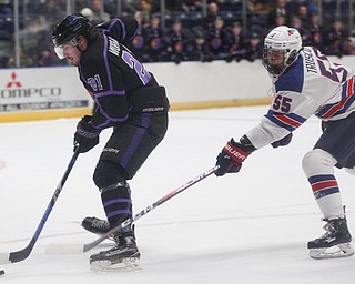 Phantoms' Brett Murray tries to keep the puck from Team USA's Jacob Truscott during their game on Sunday. EMILY MATTHEWS | THE VINDICATOR