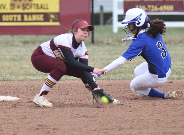William D. Lewis the Vindicator  Poland's  KaiLiGross steals 2nd as South ranges Hanna Dennison(16) tries to make the play during 4-2-19 game at SR.