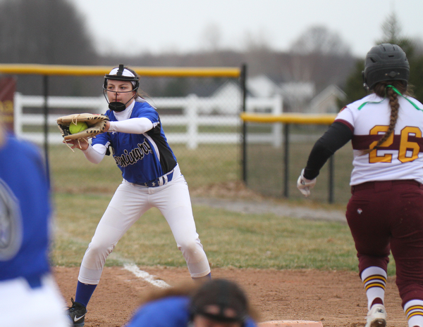 William D. Lewis the Vindicator  South Range's Kali Dudich(26) is out at 1rst as Poland's Abby Farber(6) makes the catch during 4-2-19 game at South Range.
