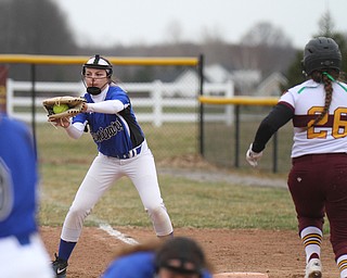 William D. Lewis the Vindicator  South Range's Kali Dudich(26) is out at 1rst as Poland's Abby Farber(6) makes the catch during 4-2-19 game at South Range.