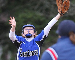 William D. Lewis the Vindicator  Poland's Lauren Sienkiewicz(11) mises a flyball duirng 4-2-19 game at South Range.