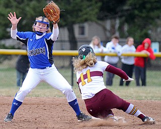 William D. Lewis the Vindicator  South Range's Bree Kohler(11) is safe at 2nd as Poland's Lauren Sienkiewicz(11) tries to make the tag during 4-2-19 game at South Range.