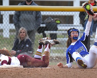 William D. Lewis the VindicatorSouth Range's Bree Kohler(11) is safe at 3rd as Poland's Kaili Gross(3) looks up for the call.
