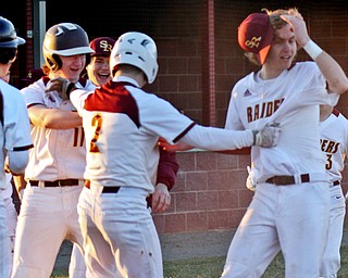William D. Lewis the VindicatorSouth Range's Luke Blasko(2) celebrates with Mike Perry, left, and Brandon Mikos after scoring winning run in game with Poland.