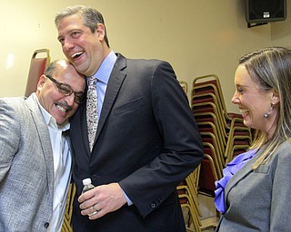William D. Lewis the Vindicator  Al Adi, left, shares a moment with US rep Tim Ryan as Ryan's wife Andrea looks on during  victory party at tArab American Community Center in Liberty for Adi who won a stay of deportation.