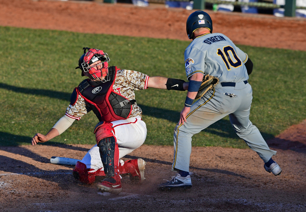 NILES, OHIO - APRIl 3, 2019: Youngstown State's Dylan Swarmer, left, tags out Kent State's Kian O'Brien during the fifth inning of their game, Wednesday evening at Eastwood Field. Youngstown State won 4-3 in eleven innings. DAVID DERMER | THE VINDICATOR
